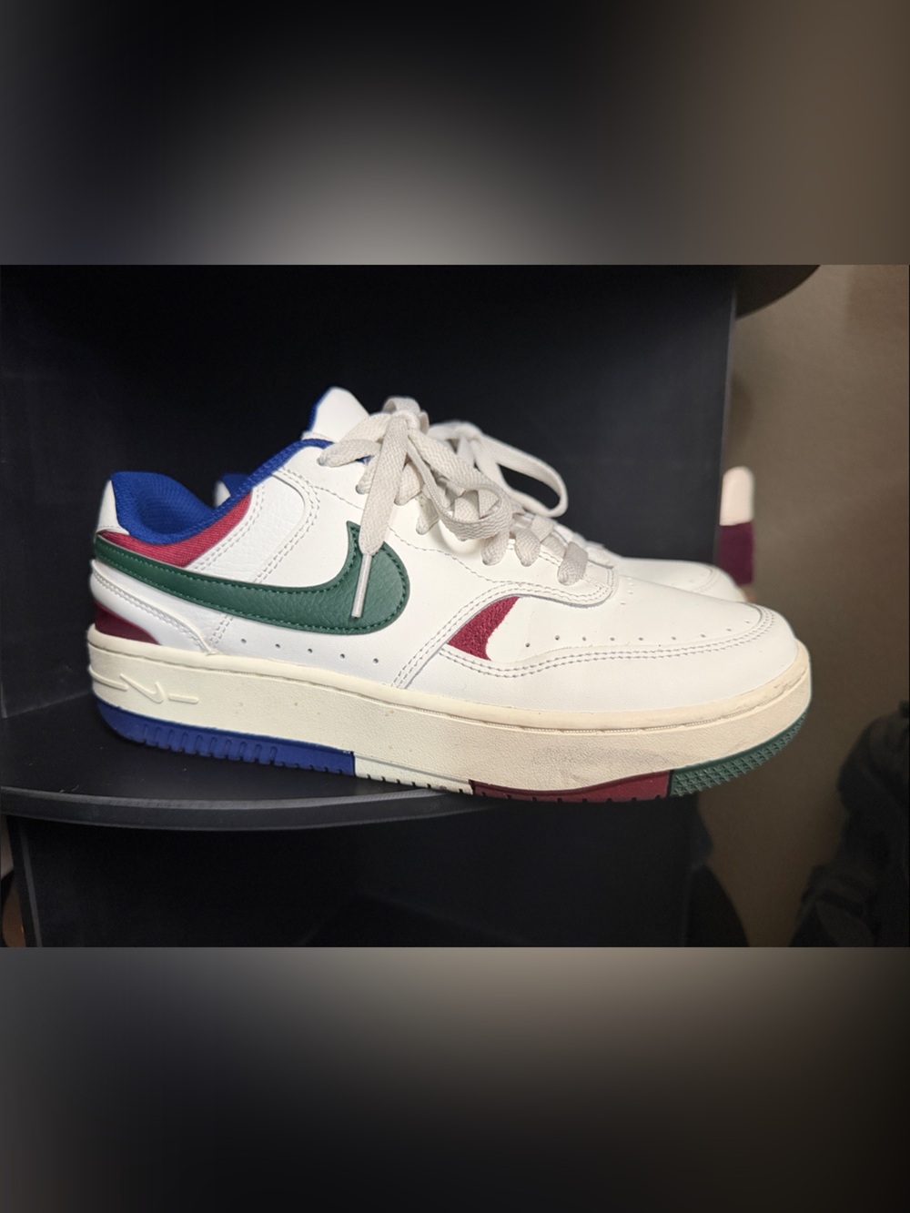 Nike White Leather Low-Top Sneaker with Green Swoosh and Blue Trim